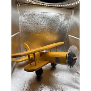 Wooden Biplane With United States Coast Guard Insignia Spinning Propeller